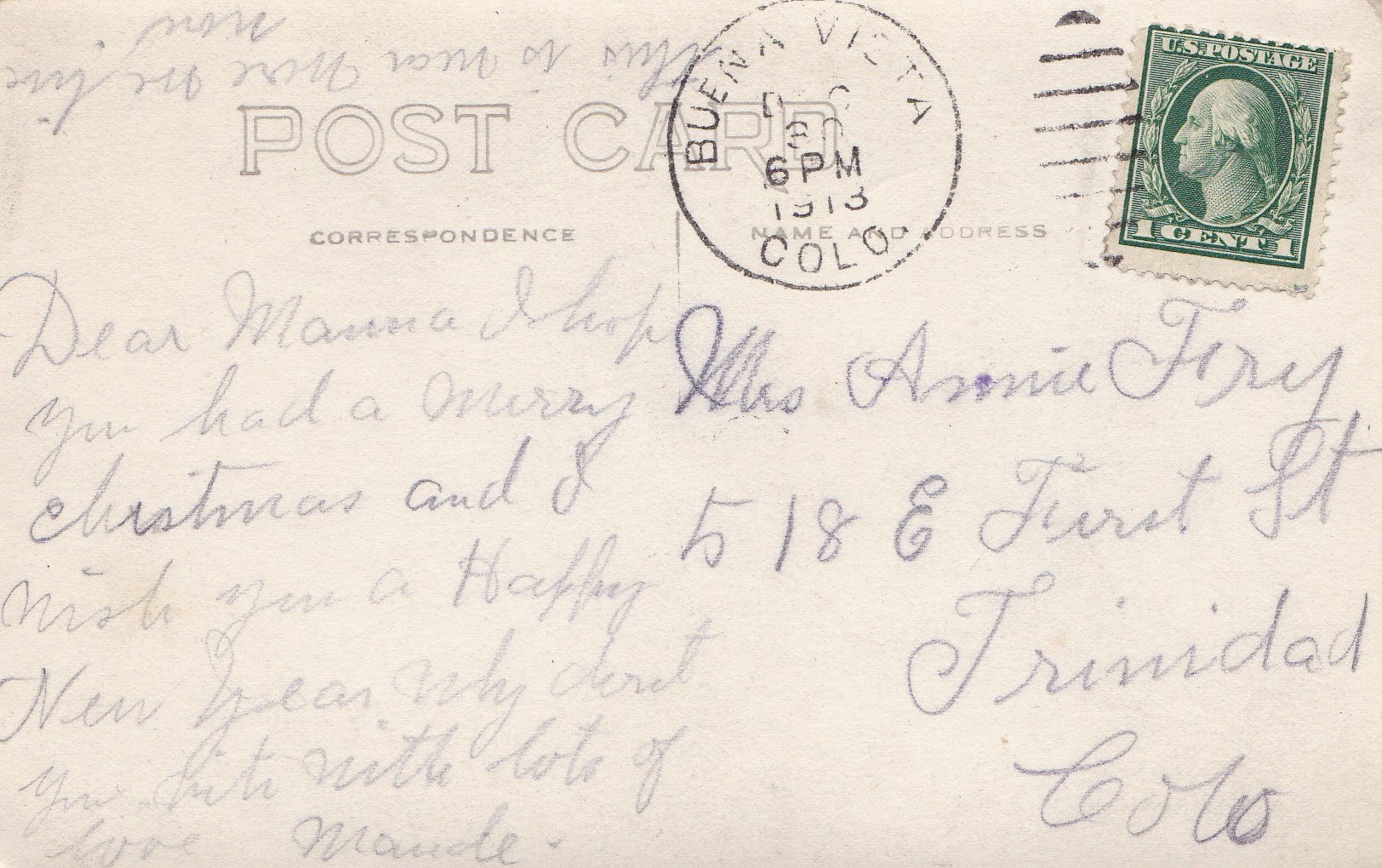 Handwritten postcard message in cursive ink...